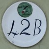 Plate with house number and ANA emblem.